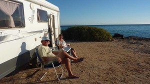 Grey Nomads taking in the view from their Motorhome